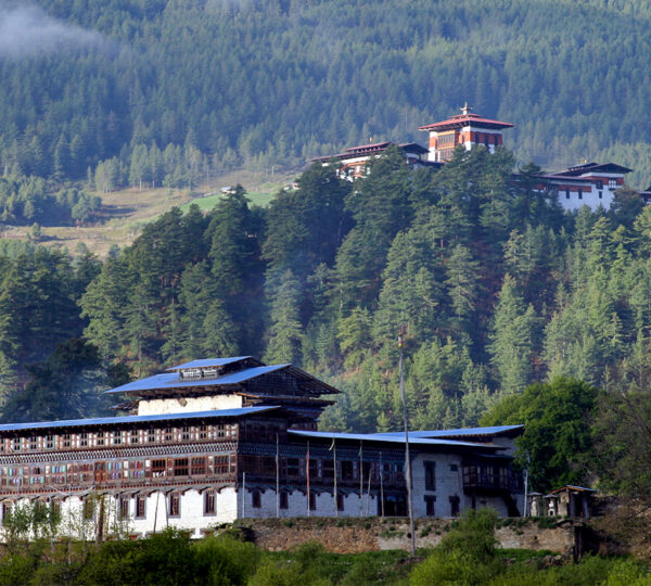 Wangduechhoeling Palace with Jakar Dzong in the background in Bumthang, Bhutan