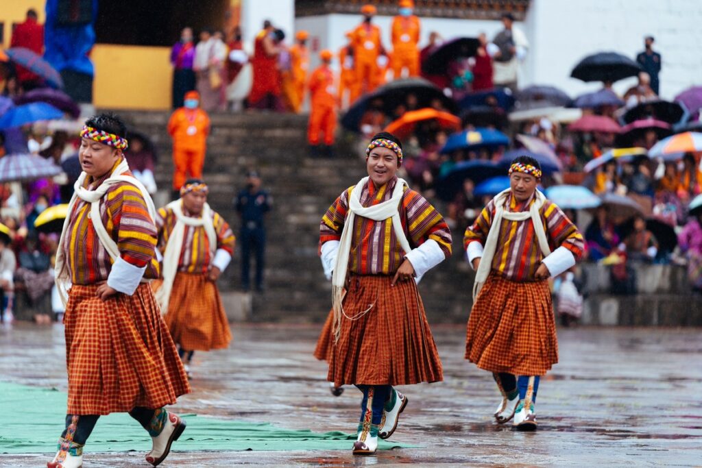 Bhutanese dancers performing a traditional dance during Thimphu Tshechu in Thimphu, Bhutan