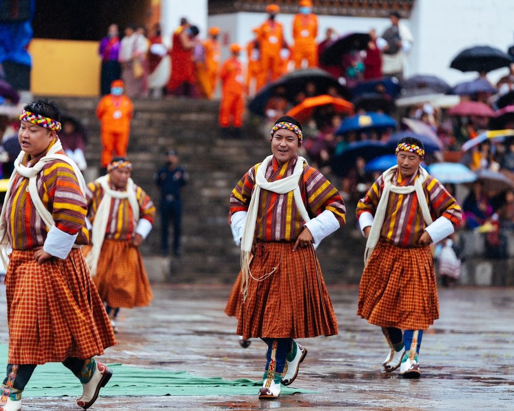 Bhutanese dancers performing a traditional dance during Thimphu Tshechu in Thimphu, Bhutan